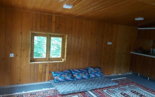 اجاره کلبه یک خوابه چوبی باغ میلا