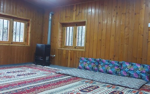 اجاره کلبه یک خوابه چوبی باغ میلا