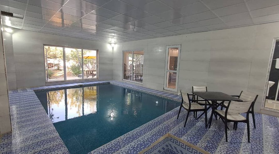 ویلا دوخوابه استخردار آبگرم باغ شکوفه خوشنام