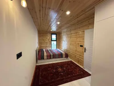 کلبه یک خوابه دوبلکس چوبی تپه