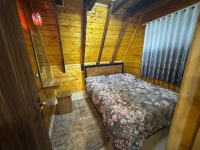 کلبه جکوزی دار دوبلکس دوخوابه سوئیسی طاهر سرا