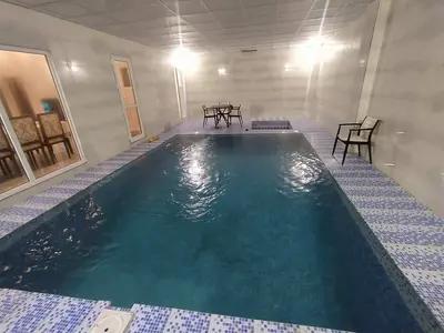 ویلا دوخوابه استخردار آبگرم باغ شکوفه خوشنام