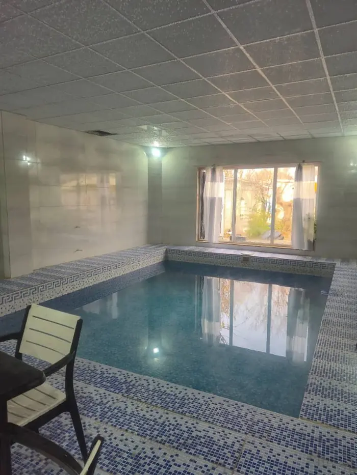 ویلا دوخوابه استخردار آبگرم باغ شکوفه خوشنام