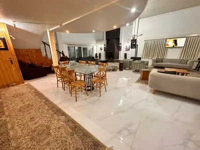 ویلا هفت خوابه استخردار آبگرم باغ خزر