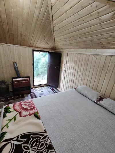 کلبه یک خوابه چوبی کورش اولسبلنگاه