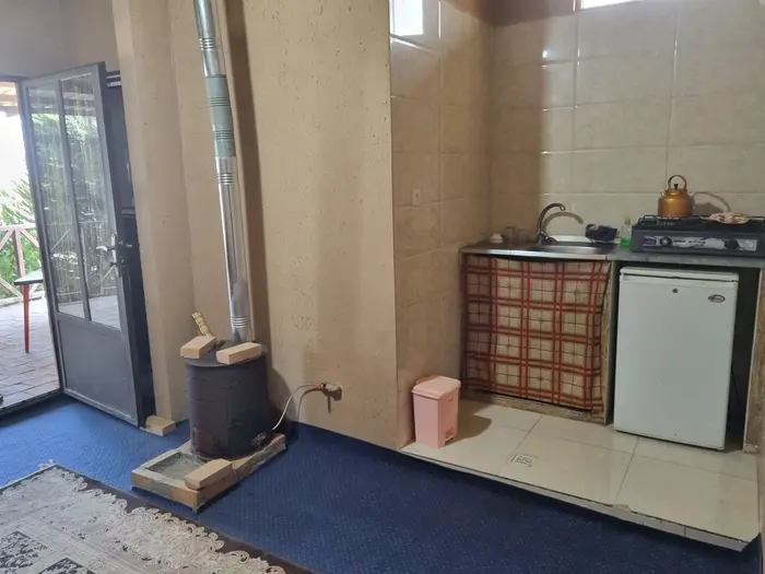 بوم گردی یک خوابه آریا مهر برفی - بخاری هیزم و گازی سنتی