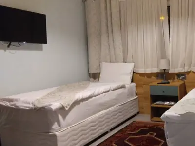 مسافرخانه شهریارنوین - واحد دوتخته تویین ۳ کارگرجنوبی