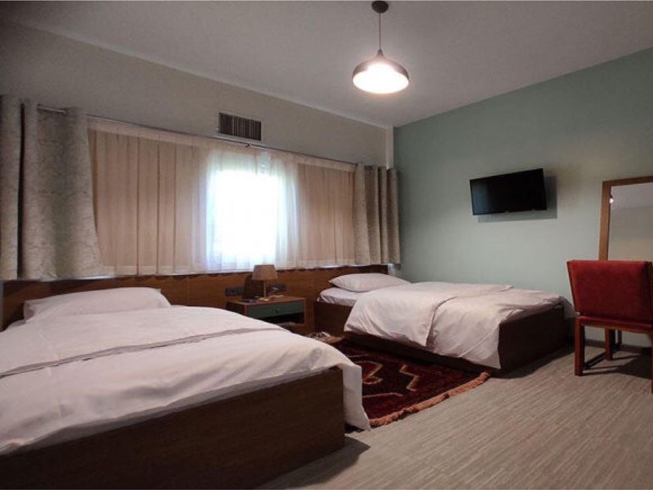 مسافرخانه شهریارنوین - واحد دوتخته ۱۰ کارگرجنوبی