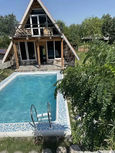 کلبه دوخوابه استخردار آبگرم باغ فردوس ۵۵