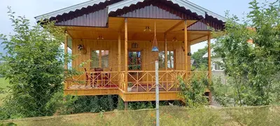 کلبه دوخوابه چوبی وحدت