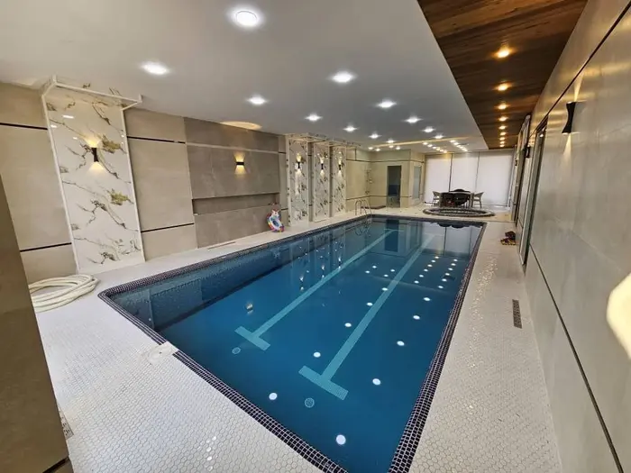 ویلا سه خوابه دوبلکس استخردار آبگرم عمارت آتلانتیس - ۵_نما روز استخر شنا داخل