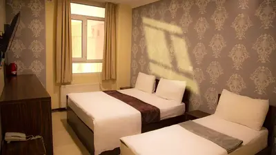 مسافرخانه نیکان مهر - واحد سه تخته 106