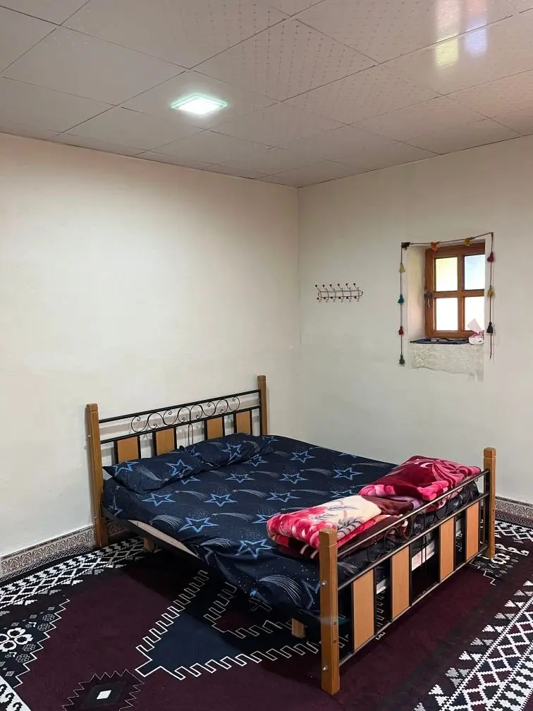 اقامتگاه سنتی الدیوان - واحد یوسف عیسی - فضای داخل،تخت دوبل