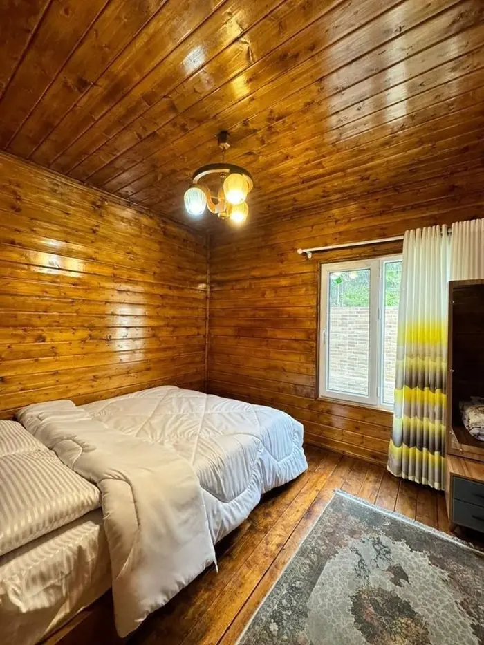 ویلا دوخوابه چوبی جنگلی بوستان