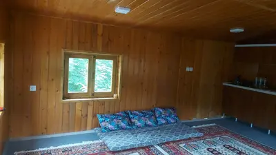 کلبه یک خوابه چوبی باغ میلا