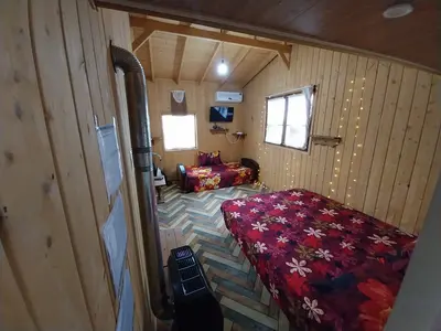 کلبه یک خوابه چوبی جنگلی محدثه