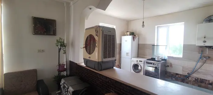 ویلا دوخوابه باغ جاوید 1 - سیستم خنک کننده و نمایی از آشپزخانه