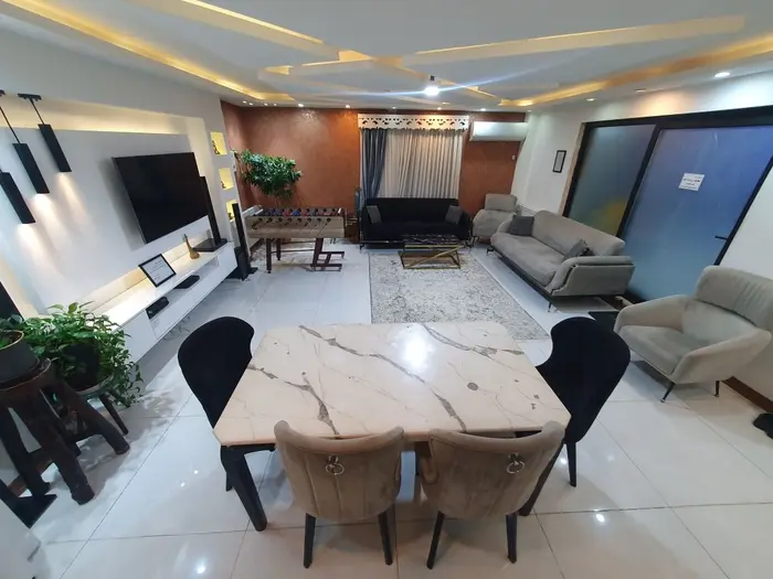 ویلا دوخوابه استخردار آبگرم شهرک نیلوفر - میز پذیرایی ۶ نفره 