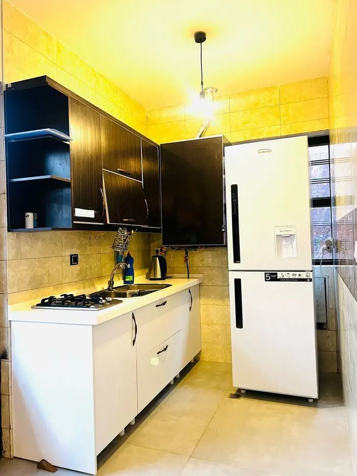 ویلا دوخوابه استخردار آب گرم باغ رویال ۱ - آشپزخانه