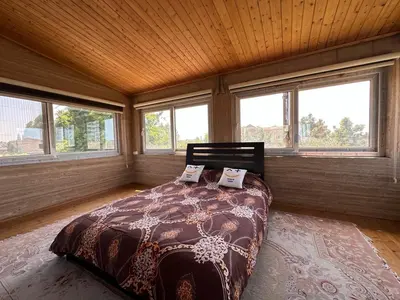 ویلا هفت خوابه استخردار آبگرم باغ خزر