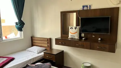 مسافرخانه محسن - واحد سه تخته 205