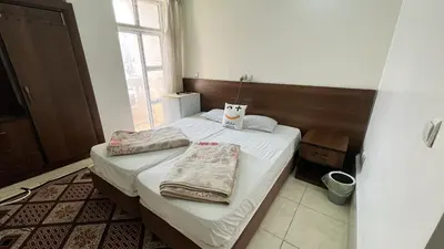 مسافرخانه محسن - واحد دوتخته 103