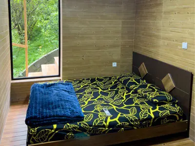 کلبه دوخوابه جنگلی جکوزی دار تیکیش