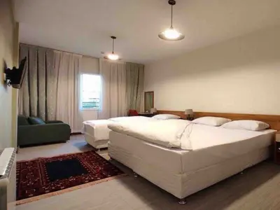 مسافرخانه شهریارنوین - واحد سه تخته کارگرجنوبی