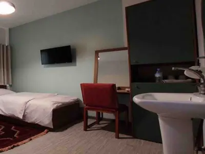 مسافرخانه شهریار نوین - واحد دوتخته تویین ۷ کارگرجنوبی