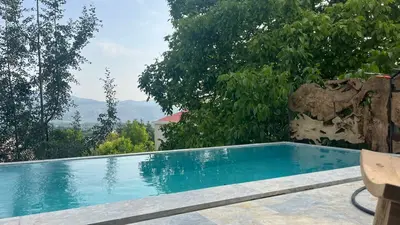 ویلا دوخوابه استخردار آبگرم چوبی دست ساز