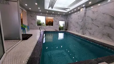 کلبه دوخوابه سوئیسی استخردار گل بانو