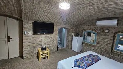 اقامتگاه سنتی ملک التجار - واحد آجری