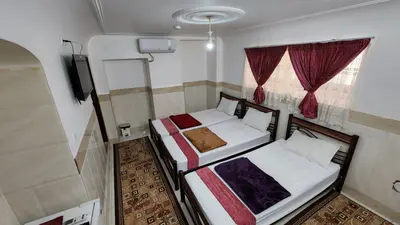 مسافرخانه شریف - واحد سه تخته 1