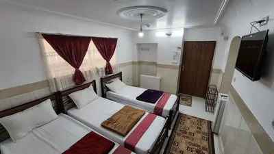 مسافرخانه شریف - واحد سه تخته 1
