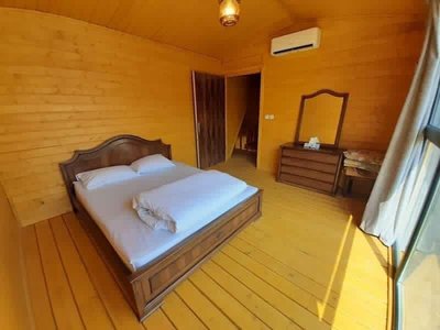 ویلا دوخوابه استخردار شله چوبی