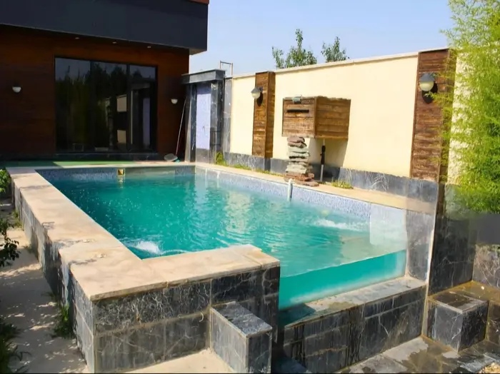 ویلا دوخوابه استخردار آبگرم مزرعه ماهان