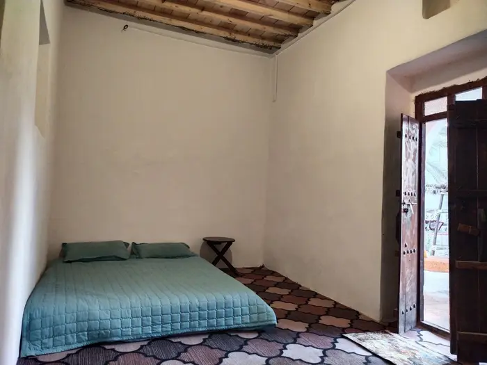 بوم گردی موم گپو - واحد موچک - تخت دونفره از داخل واحد