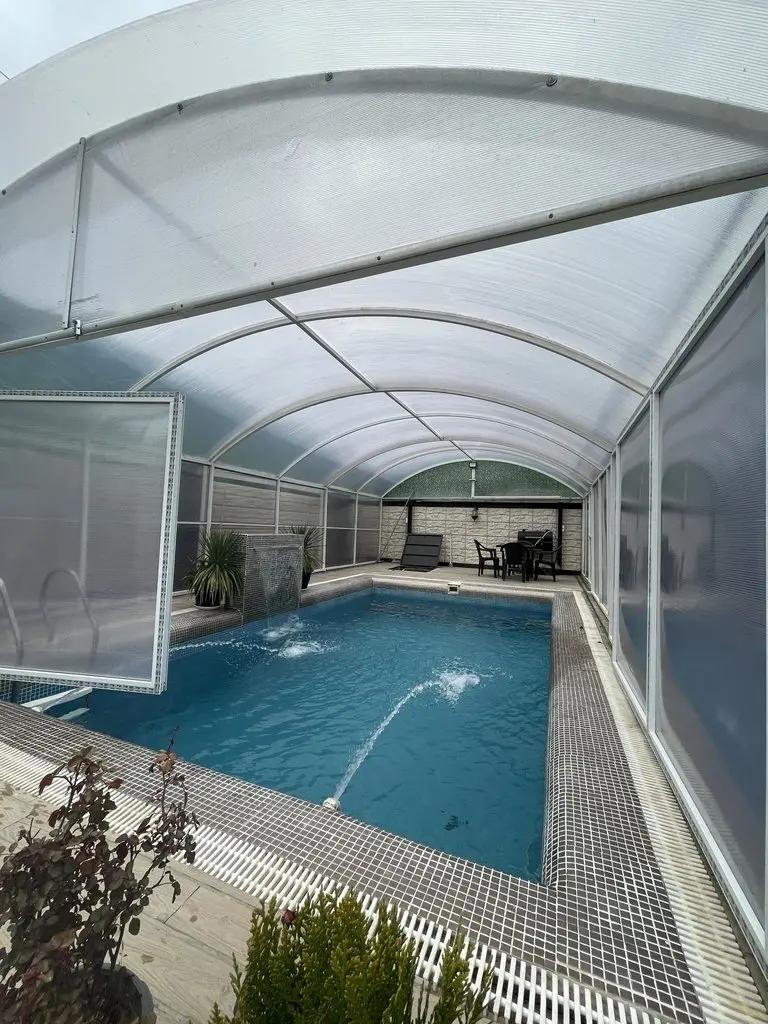 ویلا دوخوابه استخردار آبگرم منجی - استخر 