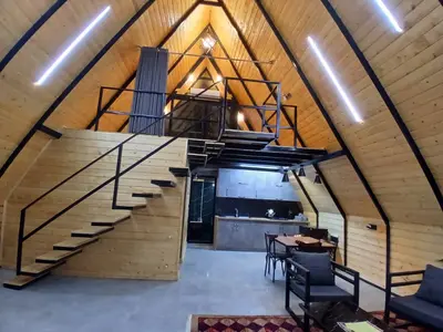 کلبه دوخوابه سوئیسی جکوزی دار باغ انار ۲