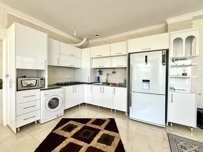 ویلا دوخوابه استخردار اکسیژن - آشپزخانه مجهز به یخچال،لباسشویی و ماکرویو