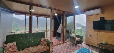 بومگردی یک خوابه چوبی جکوزی دار تیکیش طبقه ۱