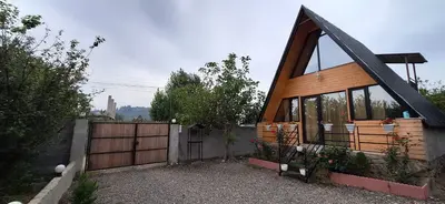 کلبه یک خوابه چوبی ثنا