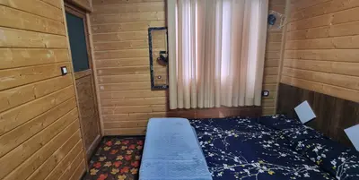 بومگردی یک خوابه چوبی جکوزی دار تیکیش طبقه ۱