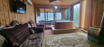 بومگردی یک خوابه چوبی جکوزی دار تیکیش 1