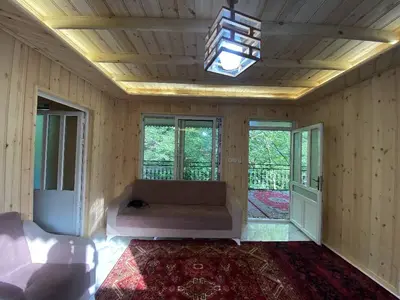 کلبه دوخوابه چوبی جنگلی بهشتی