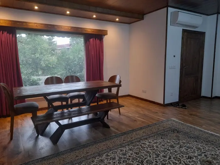 ویلا دوخوابه ساحلی استخردار آبگرم باغ خشت سر - میز غذاخوری