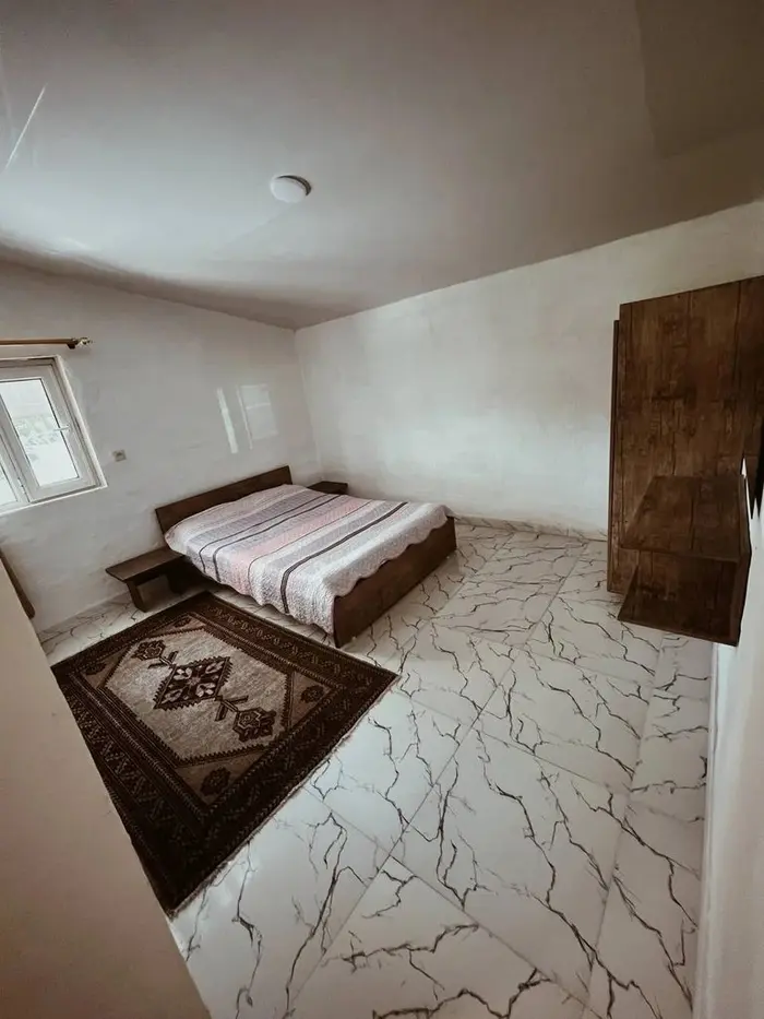 سوئیت یک خوابه خونه باغ گلی - اتاق خواب