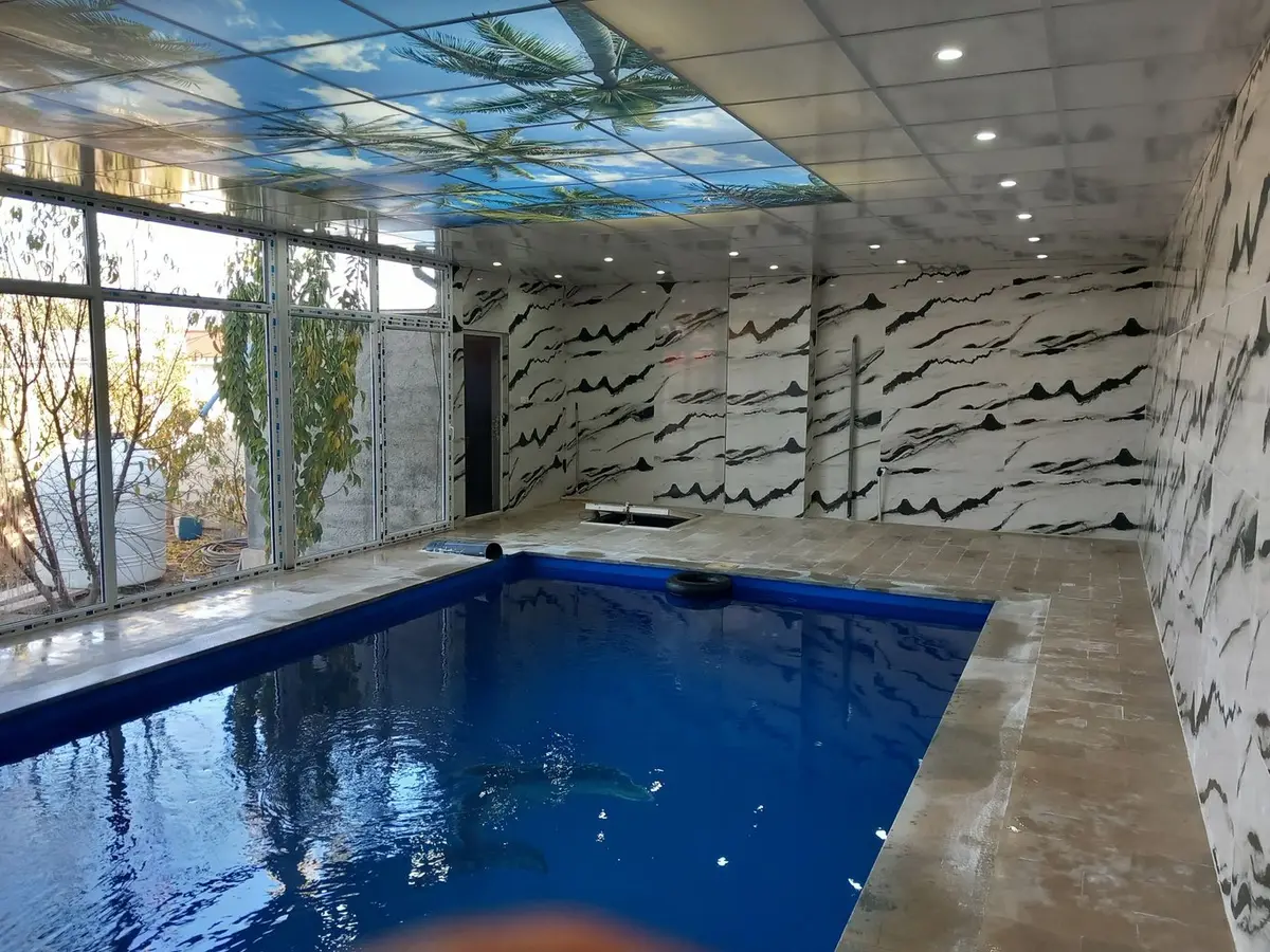 ویلا دوخوابه استخردار آبگرم درختی 6 - استخر سر پوشیده