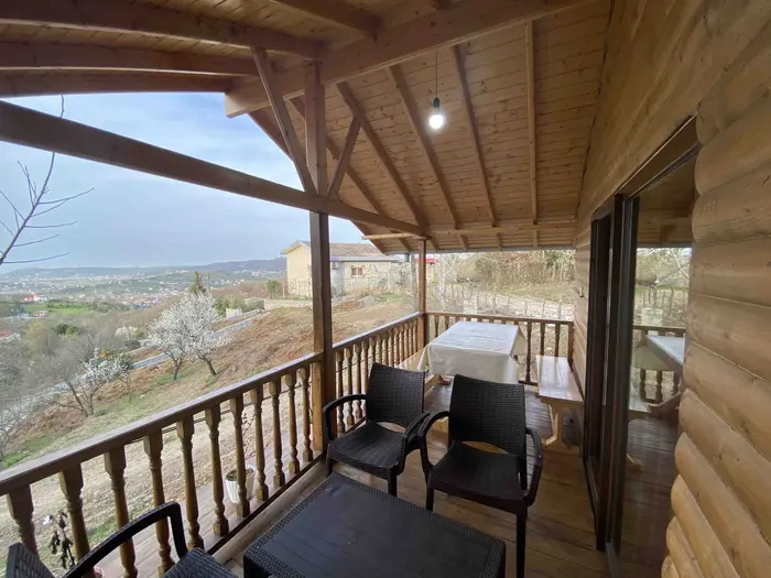 کلبه فلت چوبی دوبلکس آرامش - بالکن