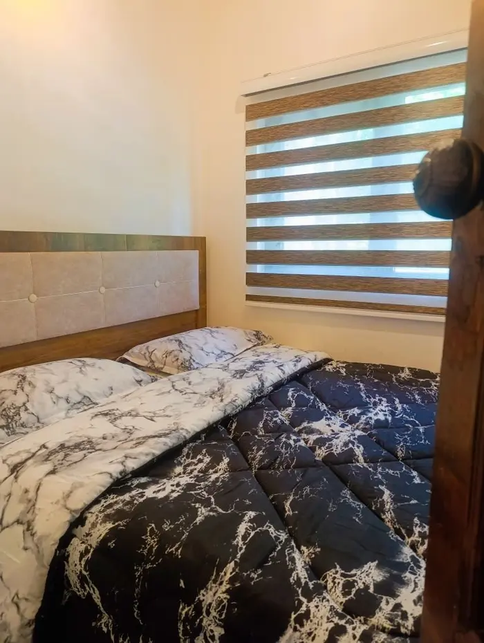 کلبه دوخوابه گیلداد گلسرک - اتاق خواب